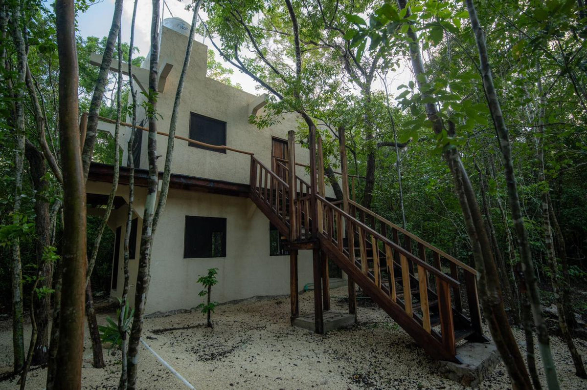 Habitación compartida con dos camas en Xamadhi.